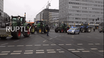 Germany_ Farmers drive tractor convoy through Berlin in protest against new regulations202127103371.gif